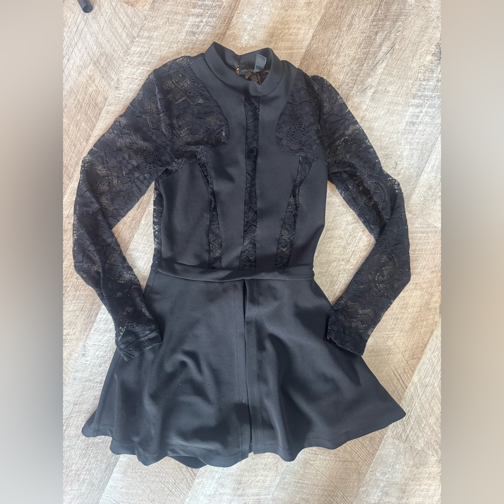 Windsor size small black w lace detailed skirt, button back lace cut out areas